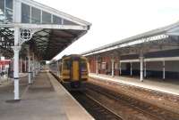 Although a modern ticket office has been built at Goole the original canopies still stand on both platforms and are in good condition. 158797 pulls away on 19 March with a Hull to Doncaster stopping service.<br><br>[Mark Bartlett 19/03/2011]