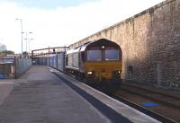 EWS 66125 runs slowly through Perth on 22 March with the return Stobart empty container train bound for Mossend.<br><br>[Brian Forbes 22/03/2011]