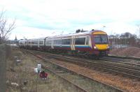 170 473 pulls out of Kirkcaldy on 19 March with a Glenrothes service.Although the siding from the Down line is used daily for terminating trains I'm not sure what the station siding in the foreground is used for, if anything. By the state of the track it's been a long time since that shunting signal changed, or a driver's shell-like was applied to the hotline.<br>
<br><br>[David Panton 19/03/2011]