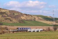 An Aberdeen - Glasgow Queen Street service heads south over the recently restored Earn Crossing on 24 March 2011.<br><br>[Brian Forbes 24/03/2011]