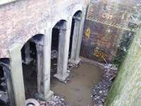 The ventilation shaft located on the site of Glasgow's new East End Regeneration route has had its protective covering taken off.. from the photograph it may look like some of the retaining wall will soon disappear!! <br><br>[Colin Harkins 26/03/2011]