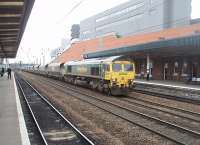 Freightliner 66510 hauls a lengthy coal train south through Doncaster in March 2011, still a busy location for both freight and passenger services. [See image 22051] for the same location 30 years earlier. <br><br>[Mark Bartlett 19/03/2011]