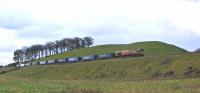 66099 climbs towards Auchterarder on 30 March with the 4D47 Inverness - Mossend Intermodal.<br><br>[John Robin 30/03/2011]