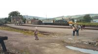 View across the yard at Dufftown with a railtour at the platform. Thought to have been taken around 1985.<br><br>[Bruce McCartney //1985]