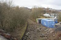 Looking west over the former Lynedoch station on the Princes Pier line in March 2011. The extensive goods station was in the distant right and at a much lower level and is now the site of Lynedoch Industrial Estate (where the buildings with the white roofs now stand). To the left was a large goods yard for the Westburn Sugar Refinery. Time hasn't been kind to the area, with a lot of the rail having vanished, probably to the scrap yard. For the situation 23 years earlier [see image 8455].<br><br>[Graham Morgan 22/03/2011]