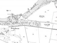 A 1921 map extract showing the simple station layout at Machrihanish, terminus of the 2'3' gauge railway from Campbeltown. The hotel shown by the station is still there, [see image 33499] and in 2012 re-opened after a major refurbishment. The station driveway has been converted into a road leading to a small housing development that encroaches onto part of the station site. <br><br>[Mark Bartlett //1921]