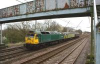 WCRC locomotive collection. No 47851 (at the rear of this group) had been sent to Barrow Hill to collect 57001 the previous day, following which the pair then headed for Barry to pick up 47768 (sandwiched between the other two). The trio then headed north to Carnforth on 31 March and are seen here passing Euxton on the fast line not far from home.<br><br>[John McIntyre 31/03/2011]