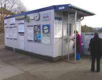 The street-level ticket office at Blairhill in Coatbridge is - shall we say - functional, and there is no enclosed accommodation for passengers here or on the platforms. However there is no shortage of information with no room for more notices or posters on the Portakabin (TM) which even boasts a clock. <br><br>[David Panton 26/03/2011]