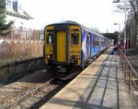 156 439 is about to leave Crookston on its way to Paisley Canal on 26 March. I'm getting an uncomprehending stare (something with which many of you will be familiar) from a passenger on the platform waiting, presumably, for the train to return from Paisley to take her into Glasgow. The 'crook' in Crookston refers to a sharp bends in the White Cart Water, rather than suggesting criminal behaviour in former residents.<br><br>[David Panton 26/03/2011]