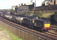 Scene at KingEdward Bridge Junction on the afternoon of Wednesday 30th September1970 with a mixed freight heading towards Tyne Yard behind Clayton no D8594. <br>
<br><br>[Bill Jamieson 30/09/1970]