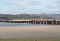 Redecking and refurbishment of Arnside viaduct underway on 7th April with two rail mounted cranes busy supporting the engineering work. The opportunity is also being taken to repair Lindal tunnel near Barrow while the line is closed. <br><br>[Mark Bartlett 07/04/2011]