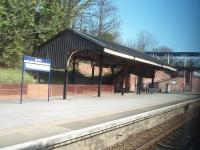 Hessle boasts this fine looking shelter on the Hull platform, so much more impressive than the usual bus shelter. This photo, taken from a Hull to Sheffield stopping train, doesn't show the dominant feature at Hessle, namely the Humber Bridge that is just off the west end of the platforms.  <br><br>[Mark Bartlett 19/03/2011]