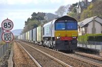 The 4A13 Grangemouth - Aberdeen intermodal train, hauled by DRS 66423, seen heading north from Dundee near West Ferry on 8 April 2011.<br><br>[Bill Roberton 08/04/2011]