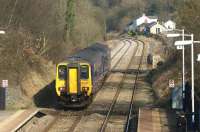 A Manchester Victoria - Clitheroe service formed by 156425 departs <br>
north from Ramsgreave and Wilpshire station on 1 March 2011. This station was a new creation on the reopening to passenger services  in the 1990s. The previous Wilpshire station was on the bend to the left and the Clitheroe bound platform can just be seen on the curve.<br><br>[John McIntyre 01/03/2011]