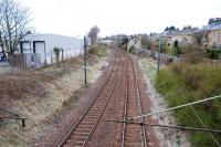 Across Springkell Avenue from Maxwell Park passenger station was the goods station. This was on the east (or south) side of the line (the inner circle side) and was located to the left in this view which looks along the line to Cathcart. It was a fair size of yard having six sidings and a loop off the line and headshunt. The little trackside building in the background right looks suspect ... a railway staff house?<br><br>[Ewan Crawford 27/03/2011]