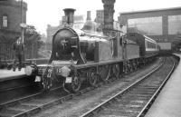 CR 123 stands at Carlisle platform 8 on 30 August 1958 carrying the headboard <I>'The Festival Special'</I>. The train is thought to be that referred to in the October 1958 issue of <I>Trains Illustrated</I> uncovered by Vic Smith which reports...  <I>'On August 30 Caledonian single No. 123 worked a trip commemorating the 1895 Race to the North. The special ran from Edinburgh (Princes Street) to Carlisle in 2 hours 14 minutes, inclusive of two stops for water'.</I> <br><br>[Robin Barbour Collection (Courtesy Bruce McCartney) 30/08/1958]