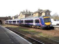 170 417 stands at the platform of the Italianate 1847 Cupar station  with an Edinburgh - Dundee semi-fast on 9 April 2011.<br><br>[David Panton 09/04/2011]