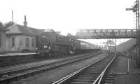 Britannia Pacific no 70002 <I>Geoffrey Chaucer</I>, minus nameplates, with an up passenger train at Carstairs, thought to have been photographed in July 1966.<br><br>[K A Gray /07/1966]