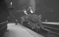 BR Standard class 5 4-6-0 no 73059 off Polmadie shed gets ready to leave St Enoch on 19 October 1965 with the 5.30pm stopping train to Carlisle.<br><br>[K A Gray 19/10/1965]