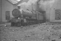 <I>The end is nigh...</I> Ex-GWR <I>Grange</I> class 4-6-0 no 6845 <I>Paviland Grange</I> standing outside Oxley shed in November 1960, with both locomotive and shed looking as though they won't be around for much longer. 6845 was eventually withdrawn from Tysley in September 1964 and cut up at Cashmores, Great Bridge, 3 months later. Oxley shed was officially closed by BR in March 1967.<br><br>[K A Gray 26/11/1960]