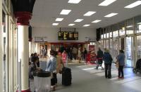 The waiting area at Dundee on 13 April. It can't really be called a <br>
concourse as it's behind the ticket barrier, so it's for travellers <br>
only. Behind the cafe is the Tay Cafe Bar, still referred to by its <br>
pre-trendy name of the Tay Bar in the BR era signs on the platform. <br>
There can't be may licensed premises that you effectively need a  ticket to get into, reminiscent of the old 'bona fide travellers' rule!<br><br>[David Panton 13/04/2011]