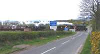 45407 and 44871 pass Whitemoss LC on 16 April with support coaches bound for Inverness in advance of the <I>Great Britain</I> special.  (An unexpected stop then ensued for about five minutes some 400 yards further on.)<br><br>[John Robin 16/04/2011]