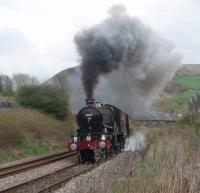 <I>Castle over Copy Pit</I>. GWR 4-6-0 5043 <I>Earl of Mount Edgcumbe</I> storms through the site of Portsmouth station (closed 1958) on 16 April 2011 as it nears Copy Pit summit with <I>The Red Rose</I> railtour from Birmingham. Lancashire was hardly a haunt of the GWR Castles in steam days but less than a week after this picture was taken a second member of the class (5029) was on the main line in the county. [See image 33749]. <br><br>[Mark Bartlett 16/04/2011]