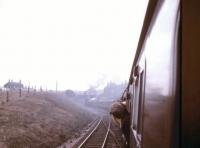 70013 <I>Oliver Cromwell</I> approaching the site of Spring Vale station (closed 1958) on the Blackburn - Bolton line south of Darwen. The train is the 'Easter Grand Tour' of 13 April 1968 from Edinburgh Waverley, which the Britannia had taken over at Hellifield. The special is running 'wrong-line' due to roof repairs being carried out in Sough Tunnel. [See image 35567]<br><br>[Jim Peebles 13/04/1968]