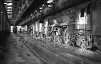 Britannia Pacific no 70025 <I>Western Star</I> is just one of a number of steam locomotives stabled inside Kingmoor shed in this photograph thought to have been taken in October 1967.<br><br>[Robin Barbour Collection (Courtesy Bruce McCartney) 28/10/1967]