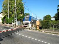 27522 on an Andorra to Foix service in 2009 just clearing the crossing at Saint-Antoine.<br><br>[Alistair MacKenzie 12/10/2009]