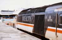 <I>'Welcome to Newquay - Happy Holidays from Newquay Town Council'</I> reads the banner at the buffer stops at Newquay station on 12 October 1992 as an InterCity 125 HST stands at the platform.<br><br>[Ian Dinmore 12/10/1992]