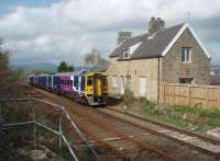 Towneley, a small station only half a mile east of Burnley Manchester Road, closed in 1952 but the station building survives as does the L&YR signal box that controls a level crossing here. With Pendle Hill in the background, 158756 passes the old station as it tackles the climb to Copy Pit summit on a Northern service to York.<br><br>[Mark Bartlett 16/04/2011]