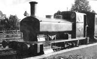 CMHW No. 1, a Barclay 0-4-0ST, sits at Grimsargh prior to working a service on the hospital railway to Whittingham. The fences in the background mark the line of the Longridge railway. This loco was new to the railway in 1888 (Andrew Barclay works No. 304) and until 1904 was the sole motive power on the two mile line. It was finally withdrawn in 1946. The sound basic design of the Barclay 0-4-0ST was steadily developed over the years and it is interesting to compare this early example with one built sixty five years later. [See image 32103]. Photo courtesy George Whiteman. <br><br>[David Hindle Collection //]