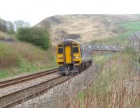 158842 climbs through the steeply sided valley leading to Copy Pit summit with a York to Blackpool service. The train is just passing through the site of Portsmouth station (closed 1958), of which no trace remains. The 158 units make light work of the steep gradients encountered on this route but the GWR Castle hauled 9 coach steam special that followed this service seemed to be travelling just as quickly. [See image 33675]<br><br>[Mark Bartlett 16/04/2011]