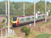 A northbound Voyager on the 0920 Birmingham New Street - Glasgow Central on 22 April enters the area controlled by Preston PSB at signal PN 1 between Standish and Coppull on the WCML.<br><br>[John McIntyre 22/04/2011]