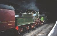 An unusual sight at Glasgow Central on 3 September 1959, with ex-GWR no 3440 <I>City of Truro</I> led by no 49 <I>Gordon Highlander</I>  arriving on a special. This was one of many specials from all parts of the country (this one had originated in Montrose) that ran in connection with the <I>Scottish Industries Exhibition</I> taking place in the city of Glasgow at that time.<br>
<br><br>[A Snapper (Courtesy Bruce McCartney) 02/09/1959]