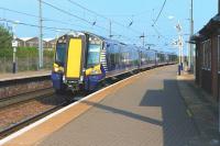 380 109 runs non-stop through Newton-on-Ayr station on 29 April with the 10.00 Glasgow Central - Ayr service.<br><br>[Colin Miller 29/04/2011]