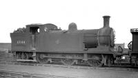 St Margarets N15 0-6-2T no 69144 in the sidings alongside Seafield shed in February 1960. <br><br>[Robin Barbour Collection (Courtesy Bruce McCartney) 07/02/1960]