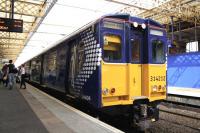 314212 at Paisley Gilmour Street on 19th April 2011 on a service to Weymss Bay. The unit is sporting its new Transport Scotland Saltire livery, following an overhaul at Glasgow Works.<br><br>[Graham Morgan 19/04/2011]