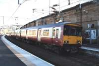 318251 at Greenock Central on 2 April with a Glasgow - Gourock train.<br><br>[Graham Morgan 02/04/2011]