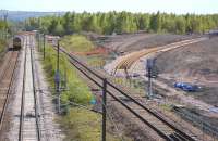 Progress at the north end of Millerhill yard on 2 May 2011. Running off to the right is the new route to Tweedbank. Over on the left 67021 waits to pick up empty stock from the yard.<br><br>[Bill Roberton 02/05/2011]