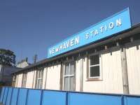 The 1879 Caledonian Railway station building at Newhaven, closed since 1962, but currently looking better than it has for some considerable time, thanks to the recent attention of The Cockburn Association. The old timber-board panelled structure, seen here in May 2011, has even been given a new nameboard. The building is currently C-listed. [See image 22916].<br><br>[John Yellowlees 02/05/2011]