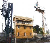 The disused but preserved signal box at Kyneton, Victoria, between Melbourne and Bendigo, photographed in October 2008. (They have a practice of turning old semaphores through 90 degrees and retaining them.) <br>
<br><br>[Colin Miller 03/10/2008]