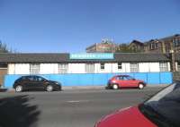 Looking east across Craighall Road at the former Newhaven station on 2 May 2011, with Trinity Academy standing in the background. The old station building has had a recent facelift [see image 33895]. <br><br>[John Yellowlees 02/05/2011]