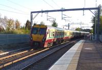 An Edinburgh to Helensburgh service departing from Drumgelloch, early evening on 3 May 2011.<br><br>[John Steven 03/05/2011]