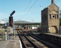 As work on the viaduct there continues, trains are still terminating at Arnside. TPE 185118 has collected a pilotman at Carnforth on 4 May and now crosses over to run <I>wrong line</I> through Silverdale to Arnside with a service from Manchester Airport. Passengers for stations from Grange-over-Sands to Barrow in Furness will have transferred to the <I>bustitution</I> service at Lancaster. <br><br>[Mark Bartlett 04/05/2011]