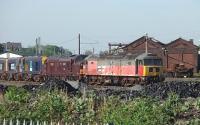 The DRS Class 37s that have been in long term storage at Carnforth (37605/612/261) departed for Carlisle in April 2011 leaving only the six DRS Class 20s and BRCW Type 3 33030 on this road behind the station. However they have been joined by Brush Type 4 No. 47772 in faded RES red livery and a smart looking West Coast EE Type 3 No. 37214. At the other end of this long line, but less accessible for photographs, were Brush Type 4 No. 47768 in green undercoat and EE Type 3 No. 37668 in faded EWS livery.<br><br>[Mark Bartlett 04/05/2011]