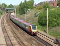 Looking towards Preston on 30 April as a northbound Voyager approaches the city having just passed Farington Curve Junction.<br><br>[John McIntyre 30/04/2011]