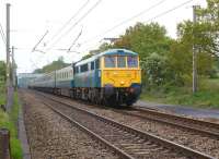 'Rail Blue Charters' Watford Junction to Edinburgh tour on 6 May 2011 with 86101 and an immaculate set of blue/grey coaches, recreating a scene on the WCML from 35 years ago. The tour is seen on the outward leg approaching Balshaw Lane Junction under a grey rather than blue sky.<br>
<br><br>[John McIntyre 06/05/2011]