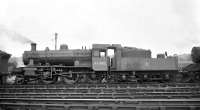 Ivatt 2-6-0 no 46498 simmering in the north yard of Carlisle Kingmoor shed in the 1960s.<br><br>[K A Gray //]